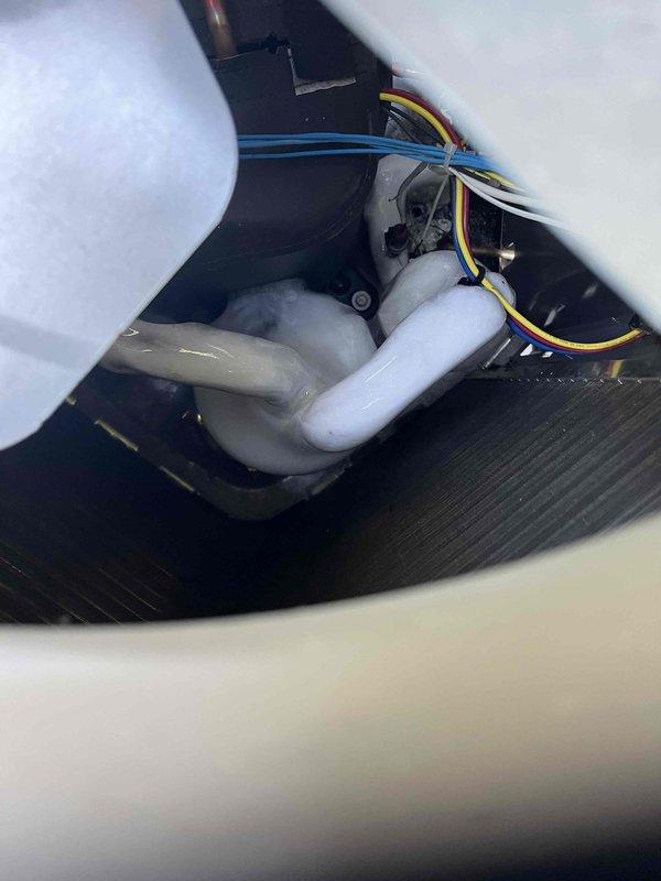 Responded to no cooling complaint with indoor temperature exceeding 80 degrees. Found air conditioning system with frozen evaporator coil and low refrigerant charge. Thawed ice from system and verified refrigerant levels were below manufacturer specifications. Presented customer with option for additional leak detection and testing to identify source of refrigerant loss, which was declined at time of service.