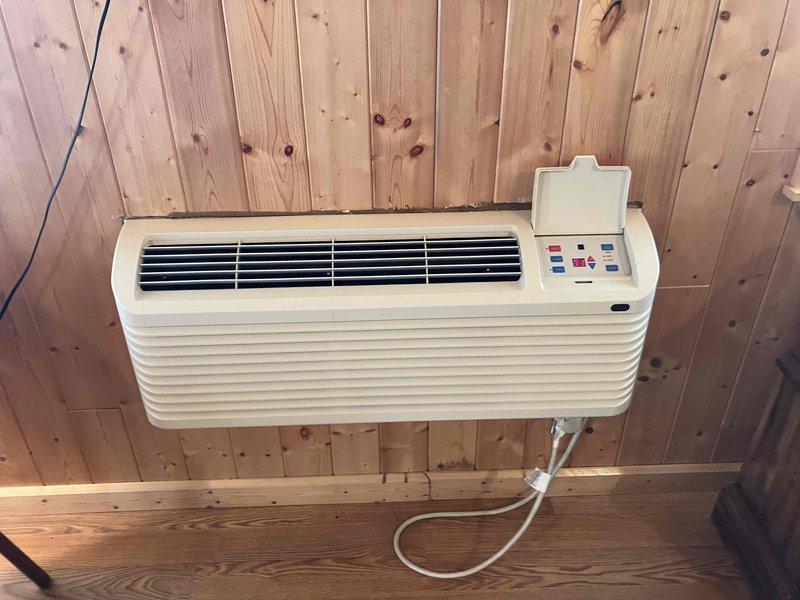 Responded to complaint of excessive fan noise from 11-year-old wall-mounted PTAC unit that had not been serviced in many years. Inspected unit and identified noise issue during cooling operation. Performed thorough cleaning and maintenance of blower assembly, secured loose components, and verified proper electrical connections. Tested unit through full cooling cycle and confirmed noise eliminated and normal operation restored.