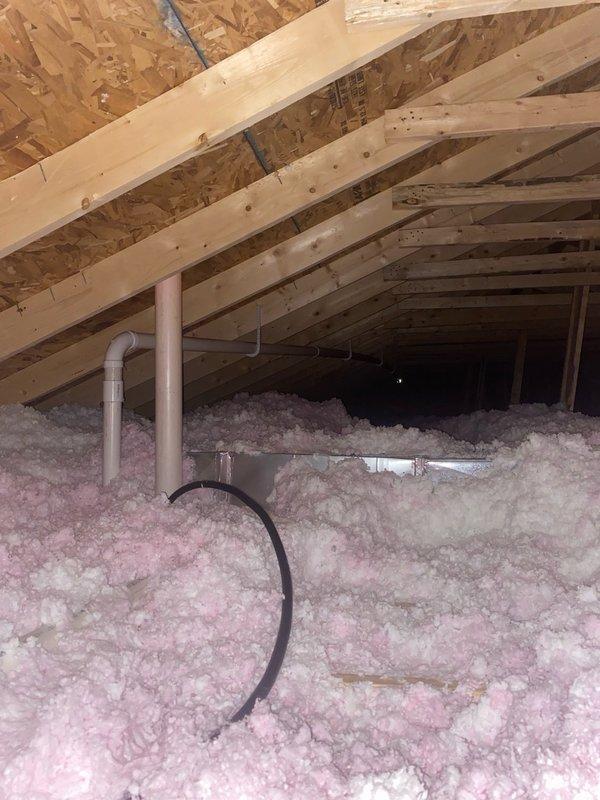 Installed 30 feet of PVC piping and 30 feet of rigid duct through attic space to rear of residence for dryer venting system. Replaced two leaking 45-degree PVC elbows on existing exhaust system. Installed booster fan to ensure proper airflow and venting capacity for extended duct run, with electrical connections completed during installation.