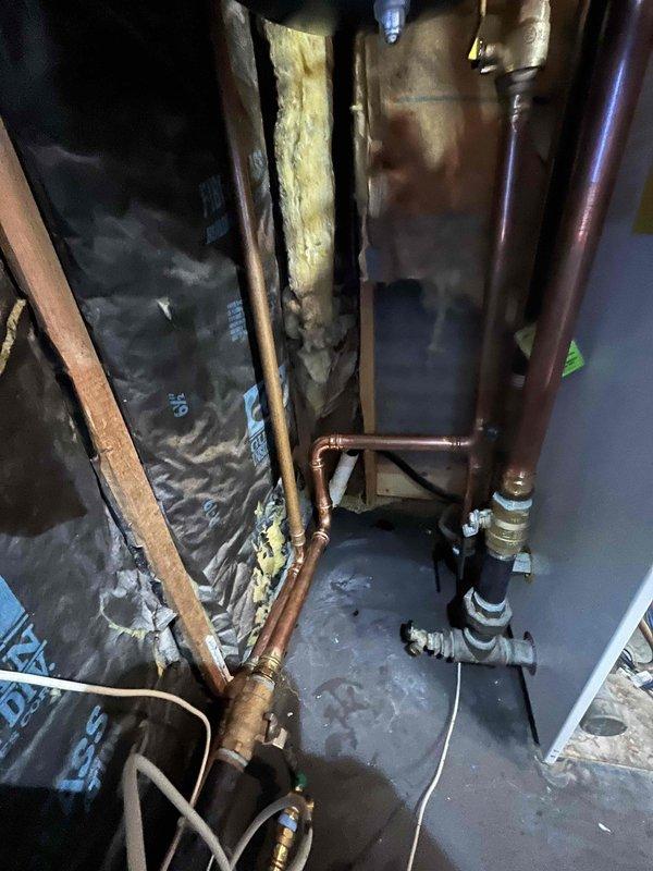 Initiated boiler room repipe to address corroded piping throughout the system. Installed new circulator pump with copper piping connections and completed partial zone manifold piping replacement. Unable to complete full repipe due to missing Taco zone valve fittings; additional corroded ceiling fittings also require replacement. System still requires antifreeze installation and air purging upon completion. Parts list compiled and submitted for return trip to finish zone manifold connections and finalize repipe work.