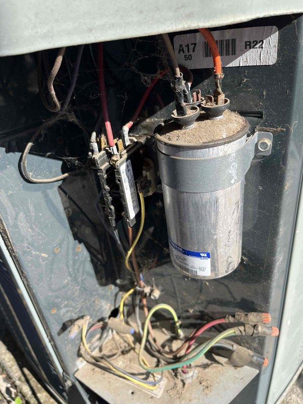 Responded to no cooling complaint on rooftop unit. Upon inspection, identified failed capacitor with visible deterioration and damaged power whip conduit. Breaker exhibited abnormal noise when system shut off, indicating potential electrical hazard. Discovered authorization discrepancy as building owner was not informed of service call or equipment issues by tenant who scheduled appointment. Due to lack of proper authorization from property owner, discontinued service and did not proceed with repairs for safety and liability reasons.