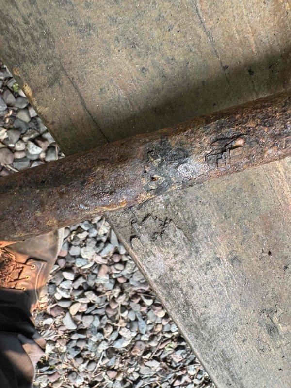 Identified severely corroded gas piping at exterior foundation requiring immediate replacement due to safety concerns. Sold and scheduled gas piping replacement work to address the hazardous condition and ensure proper system integrity.