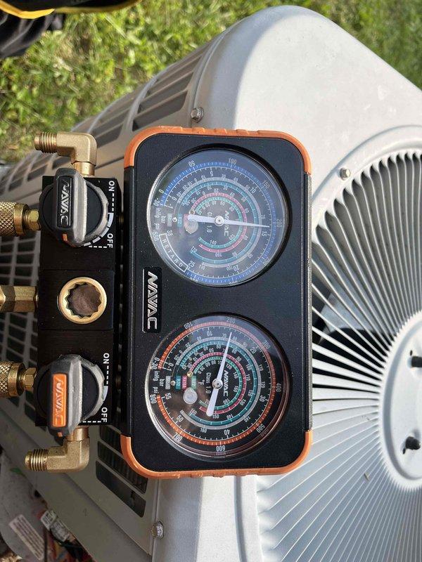 Responded to no cooling call on 12+ year old air conditioning system. Found high pressure switch on outdoor condensing unit had tripped, preventing compressor operation. Verified system pressures using manifold gauges and confirmed switch failure. Reset switch and tested system operation. Provided customer with options for pressure switch replacement and full system upgrade given age of equipment.