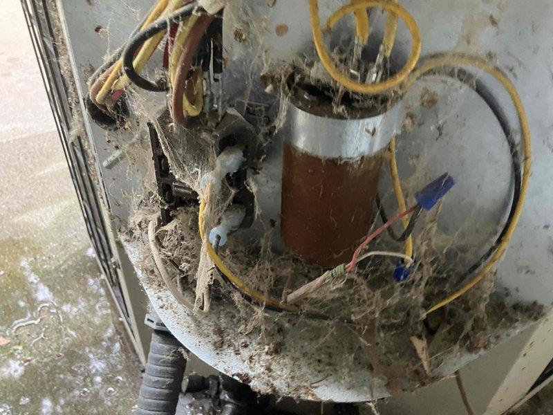 Responded to emergency no-cool call on 25-year-old air conditioning system with frozen evaporator coil. Upon inspection, found severely restricted airflow caused by heavily soiled air filter. Replaced dirty filter with new 16x20x1 pleated filter to restore proper system airflow. Observed blower motor assembly with significant debris accumulation and deterioration, indicating extended maintenance neglect. System operational after filter replacement, restoring cooling capacity to residence.