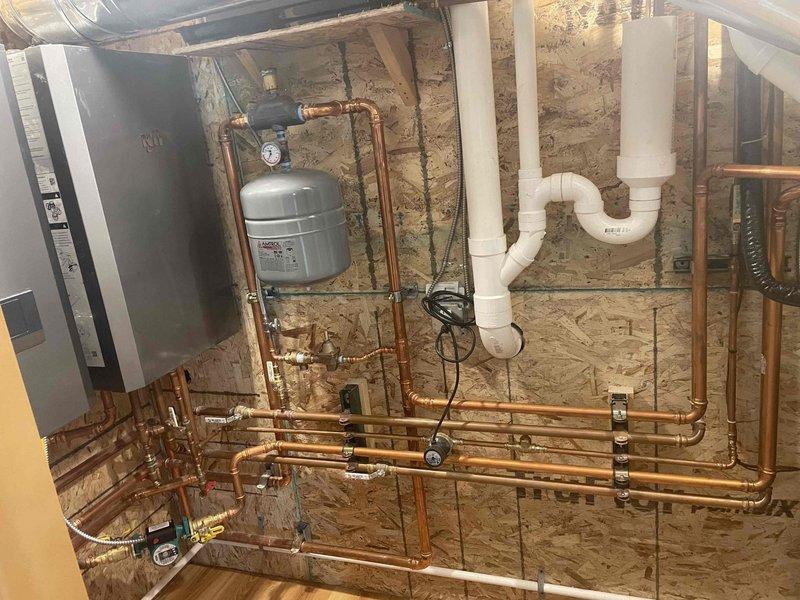 Completed annual preventive maintenance on water conditioning system. Performed water quality testing before and after system operation, confirming proper functioning of water softener equipment with green fiberglass tank and digital control head. Inspected all plumbing connections, copper piping, valves, and pressure tank components to ensure system integrity and optimal performance.