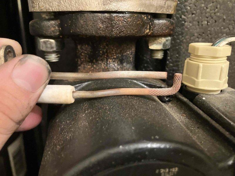 Responded to no heat and no hot water complaint on 99COD combi boiler. Upon inspection, confirmed failed heat exchanger showing significant corrosion and deterioration on mounting components and internal assemblies. Blower assembly also failed and non-operational. Extensive rust damage observed throughout critical components including metal flanges and connection points, indicating advanced system deterioration. Evaluated system for potential repair versus replacement. Due to severity of heat exchanger failure, extent of corrosion damage, and failed blower motor, determined unit was beyond economical repair. Provided second opinion confirming replacement recommendation. Documented equipment condition with photos showing corroded mounting hardware, deteriorated internal components, and failed blower assembly. Installed new replacement boiler unit to restore heating and domestic hot water service.