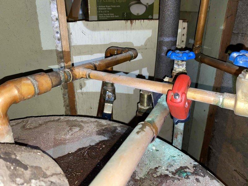 Successfully installed a Bradford White 75-gallon power vent water heater with 3/4" copper supply connections. Removed a section of concrete wall to accommodate 3" PVC power vent piping and installed complete venting system to exterior. Connected all water supply lines, installed required shutoff valves, and verified proper operation of the unit upon completion.