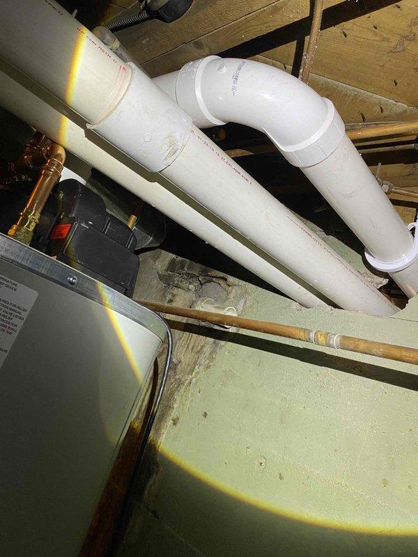 Successfully installed a Bradford White 75-gallon power vent water heater with 3/4" copper supply connections. Removed a section of concrete wall to accommodate 3" PVC power vent piping and installed complete venting system to exterior. Connected all water supply lines, installed required shutoff valves, and verified proper operation of the unit upon completion.