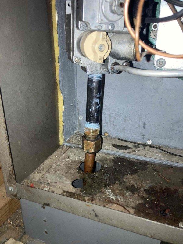 Responded to gas leak emergency at furnace location. Upon arrival, gas supply had been shut off by homeowner. Inspection confirmed active leak at standing pilot supply line connection. Removed defective standing pilot assembly and associated tubing. Installed replacement components, pressure tested all gas connections for leaks, restored gas supply, and verified proper system operation. Unit returned to safe working condition.