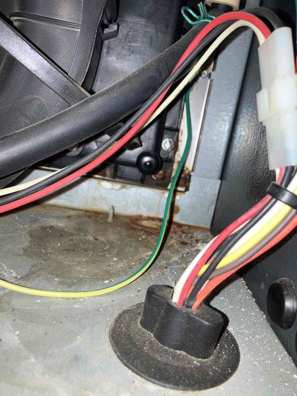 Responded to no heat and no cool condition on 16-year-old furnace and air conditioning system. Upon inspection, diagnosed failed inducer motor preventing proper system operation. Removed defective inducer motor assembly, installed replacement motor, verified all electrical connections, and tested system for proper heating and cooling function. Unit restored to normal operation with inducer motor cycling correctly and system responding to thermostat calls.