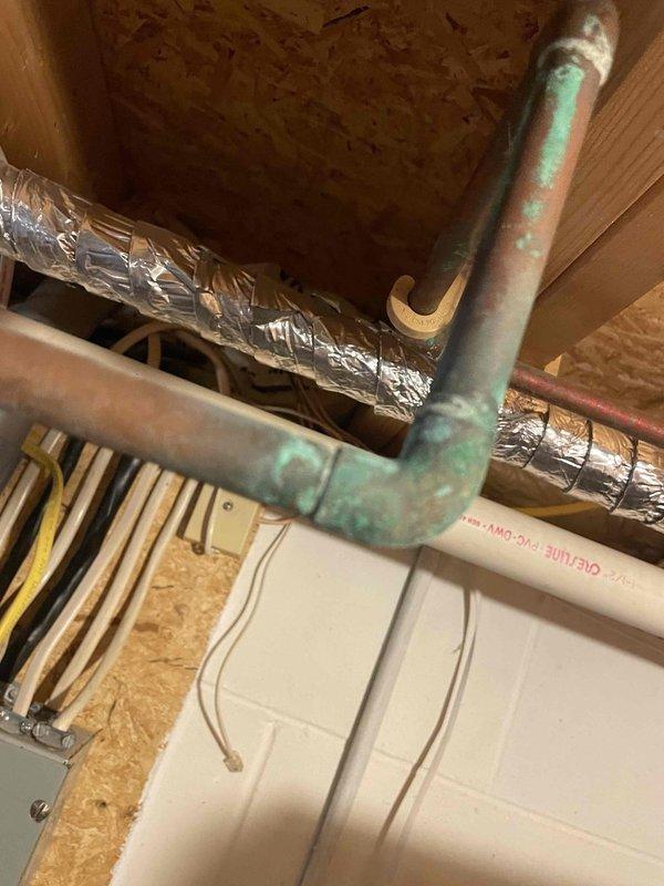 Completed annual prepaid inspection on water conditioning system and identified pH level changes from previous service. Documented corroded copper piping with significant verdigris oxidation in ceiling space requiring replacement. Discussed water quality concerns, repiping options for deteriorated copper lines, and provided rough cost estimates to allow homeowner to plan for necessary repairs.