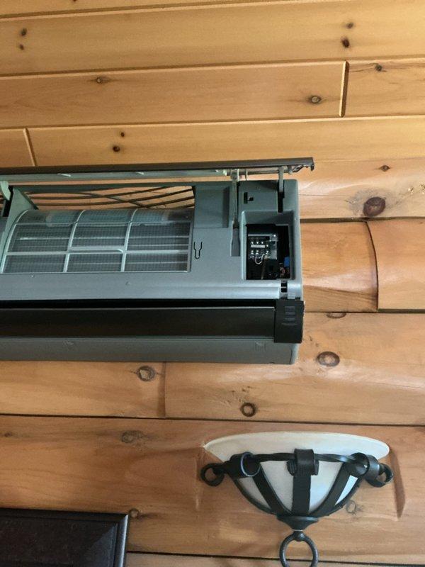 Responded to no cooling complaint on mini split system with flashing indicator light. Diagnosed and replaced failed condenser fan motor. Installed shielded mini split wire to correct previous wiring deficiency and ensure proper electrical connections between indoor wall-mounted evaporator unit and outdoor condenser. Verified all electrical terminations at terminal block, confirmed proper operation of system controls, and tested unit through complete cooling cycle with satisfactory performance restored.