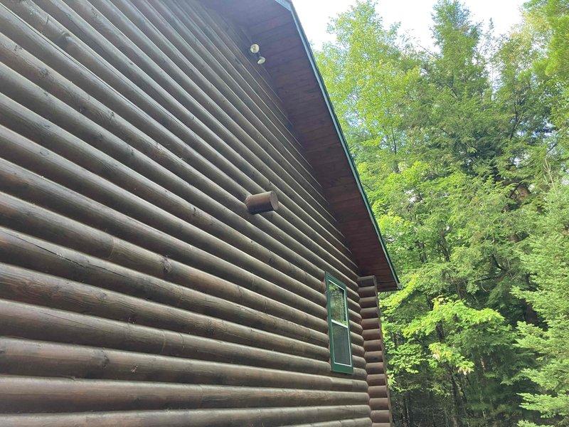 Responded to service call for high humidity and mold issues in loft area of log cabin structure. Assessed indoor air quality conditions and ventilation system performance. Customer reported dehumidifier filling rapidly, indicating excessive moisture levels in the space. Evaluated existing HVAC system including mini-split unit and whole home humidifier operation. Documented interior and exterior conditions of loft area, noting log construction and current ventilation provisions. Provided professional recommendations for improved air circulation and humidity control solutions to address ongoing moisture concerns and prevent further mold growth.