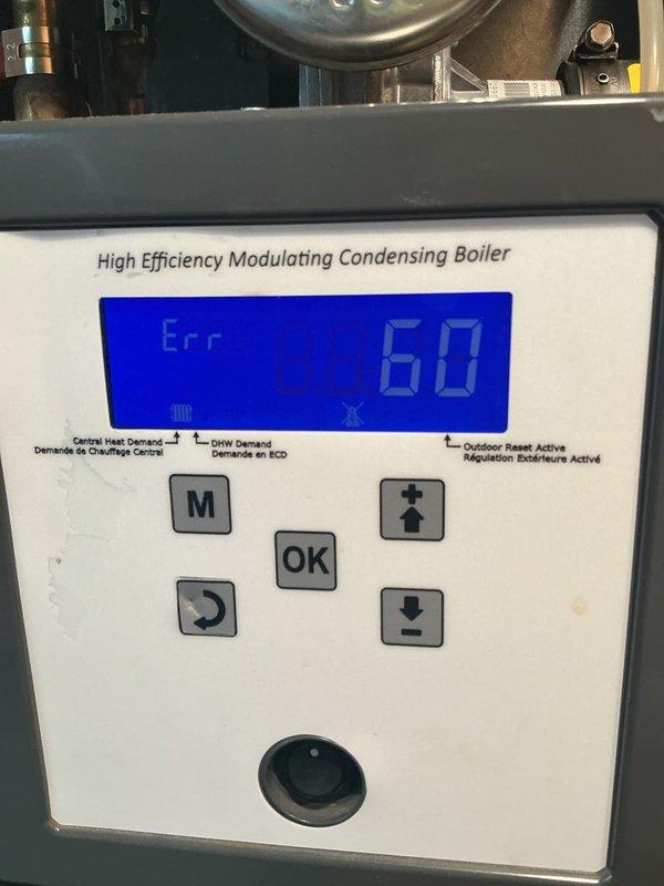 Responded to no heat call on high efficiency modulating condensing boiler displaying Error 60 code, indicating excessive temperature detected in exhaust flue. Performed diagnostic evaluation and documented system conditions with photos showing error code on control panel display. Unable to complete repairs during this visit; follow-up appointment required to resolve flue temperature issue and restore heating operation.