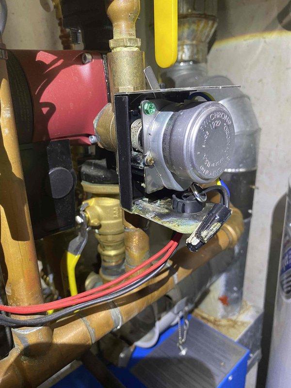 Completed annual prepaid maintenance inspection on boiler system. Inspected all components including chrono proportional control, zone valves, piping connections, and electrical systems. Identified corrosion on main floor zone valve with evidence of water intrusion into electrical box affecting wire nuts; no active pooling observed at time of inspection. Documented findings with photographs and provided estimate for zone valve replacement, which customer has elected to defer until next annual service.