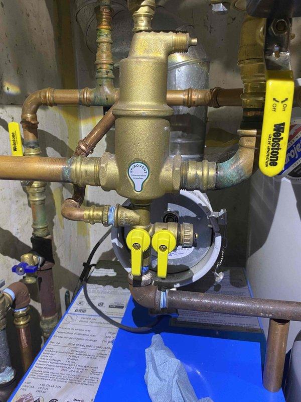 Completed annual prepaid maintenance inspection on boiler system. Inspected all components including chrono proportional control, zone valves, piping connections, and electrical systems. Identified corrosion on main floor zone valve with evidence of water intrusion into electrical box affecting wire nuts; no active pooling observed at time of inspection. Documented findings with photographs and provided estimate for zone valve replacement, which customer has elected to defer until next annual service.