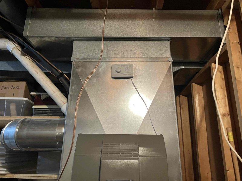 Successfully installed an 18-gallon fan-powered Healthy Climate humidifier system in conjunction with furnace installation. Completed all necessary supply water line connections, drain line routing, and electrical wiring to integrate the humidifier with the existing HVAC system. Mounted the main humidifier unit and control box, verified proper ductwork connections, and ensured all components are operational to provide desired humidification levels throughout the home.