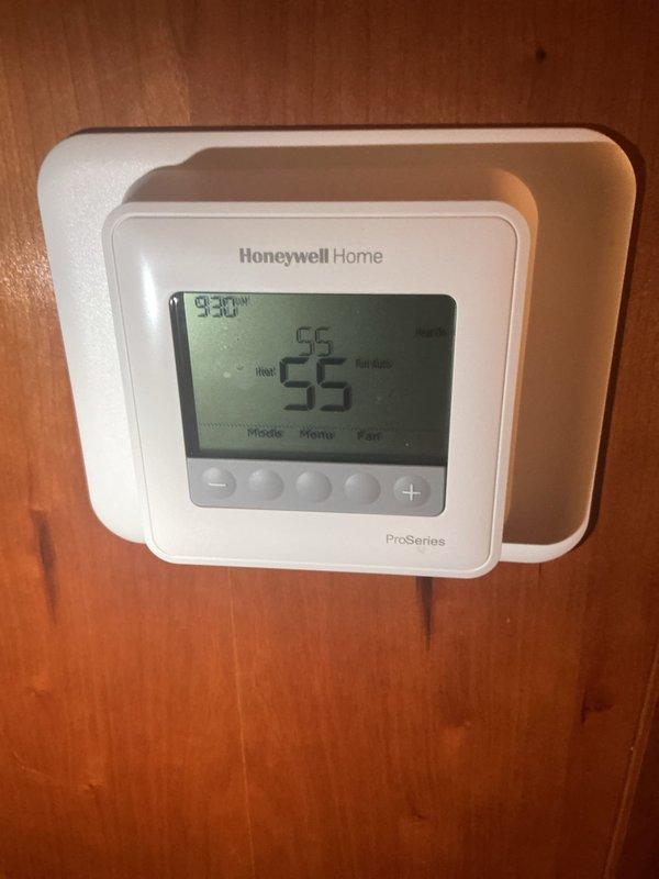 Completed annual maintenance inspection on 26-year-old Goodman ASX160311AB air conditioning unit utilizing R-410A refrigerant. Performed comprehensive system evaluation including electrical connections, refrigerant pressures, and thermostat operation verification. Identified and documented need for saddle valve replacement on humidifier system for future service.