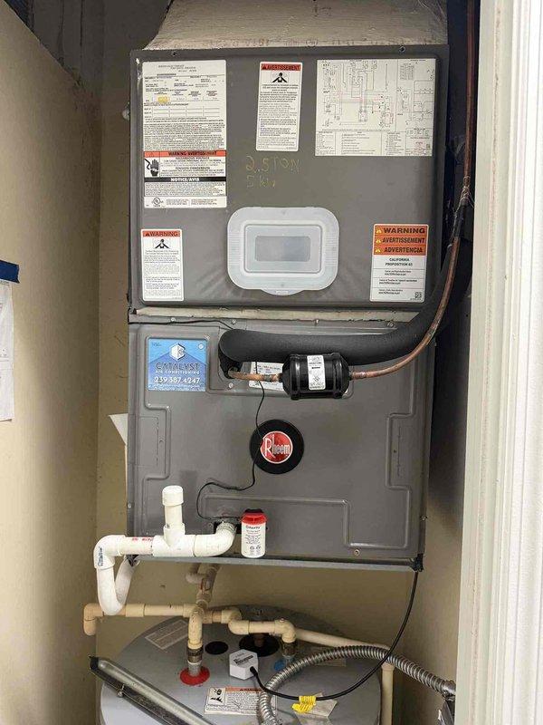 Responded to service call for water leak on HVAC system. Upon inspection, identified condensate drainage issue at indoor air handler unit located in utility closet. Cleared condensate drain line obstruction and verified proper drainage flow through PVC piping system. Inspected condensate pump operation and confirmed functionality. Checked both indoor air handler and outdoor Rheem condensing unit for proper refrigerant levels and system operation. Verified all connections, fittings, and drain components were secure and leak-free. System tested and returned to normal operation with no further water leakage observed.