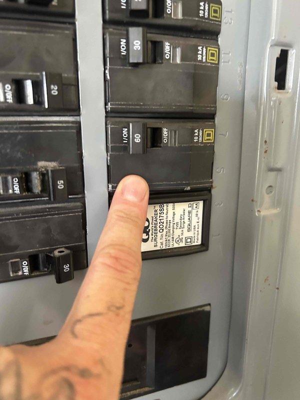 Completed full system estimate for dual HVAC installation consisting of 3-ton and 2.5-ton Goodman units. Assessed electrical panel capacity and verified adequate breaker configuration to support both condensing units, with existing Square D breakers rated appropriately for the installation. Evaluated exterior installation site where both Goodman condensing units are positioned on concrete pads against building exterior wall. Documented existing refrigerant line sets, PVC condensate drainage, and electrical conduit routing. Photographed equipment placement, electrical infrastructure, and site conditions to provide comprehensive documentation for proposed system installation.