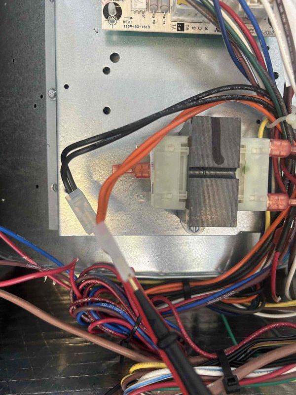 Responded to service call for non-functioning thermostat. Upon arrival, inspected HVAC control panel and thermostat wiring connections. Documented existing wire terminations at both the air handler control board and wall-mounted thermostat, verifying proper connections for R, C, Y, Y2, G, O/B, W, W2, and auxiliary terminals. All wiring found secure with no loose connections or damaged conductors. System restored to normal operation.