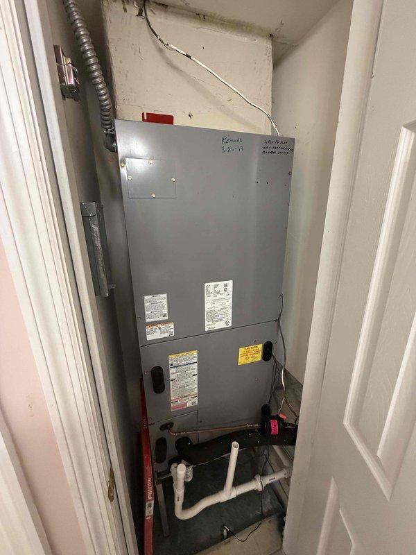 Fort Myers, FL - Responded to service call for air handler water leak at residential property. Upon arrival, inspected HVAC air handler unit installed in interior utility closet. Conducted thorough visual inspection of unit and surrounding area to identify source of water leakage. Examined condensate drain system including white PVC drain lines at base of unit for proper pitch, blockages, and secure connections. Checked condensate drain pan for cracks, overflow conditions, and proper drainage. Inspected drain line termination point to ensure unobstructed flow. Verified air filter condition and airflow as restricted airflow can cause coil freezing and subsequent water overflow. Examined evaporator coil area for ice formation or excessive condensation. Tested condensate pump operation if equipped. Cleared any blockages found in drain line system. Verified all electrical connections and safety controls functioning properly. Confirmed unit operational after repairs with no active leaking observed at time o
