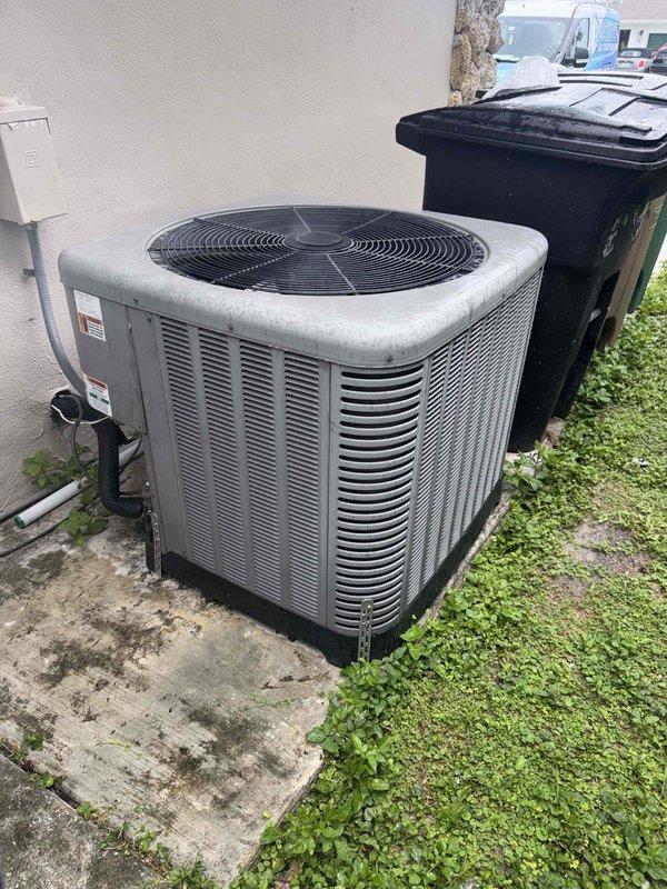 Cape Coral, FL - Responded to no cooling complaint on residential split system. Customer reported unit failed to cool after being turned off for several hours. Performed diagnostic inspection of outdoor condensing unit and indoor air handler. Documented equipment condition and installation with photos showing outdoor unit on concrete pad with proper clearances and indoor air handler ceiling-mounted in attic space. Refrigerant lines and electrical connections inspected at both indoor and outdoor components. System evaluated for proper operation and potential causes of cooling failure identified for repair recommendations.