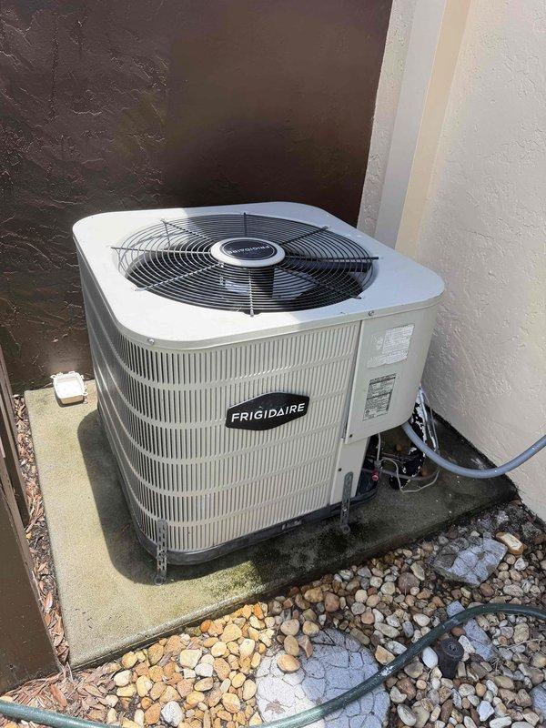 Cape Coral, FL - Responded to no cooling complaint on 2008 Frigidaire residential HVAC system serving 1475 square foot home with unknown service history. Performed system inspection of outdoor condensing unit and verified electrical connections at main panel, documenting equipment condition and installation configuration for new homeowner's records.