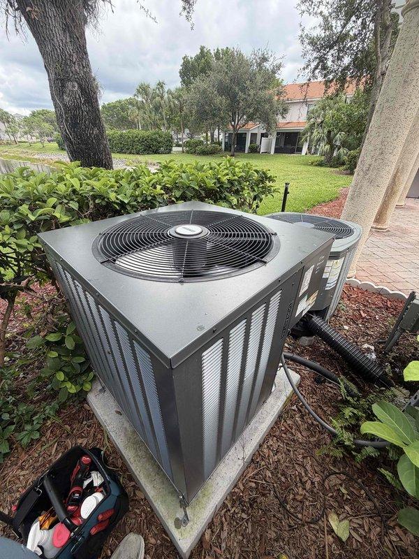 Naples, FL - Completed routine maintenance inspection as part of a scheduled preventive maintenance agreement visit (3 of 4). Serviced dual outdoor HVAC condensing units located in landscaped side yard area and inspected associated ductwork system in attic space. Verified proper operation of both air conditioning units, checked refrigerant levels, cleaned condenser coils, and inspected electrical connections. Examined flexible duct runs in attic crawl space for proper insulation integrity, secure fastening, and absence of air leaks. All systems found operating within normal parameters with no immediate repairs required.