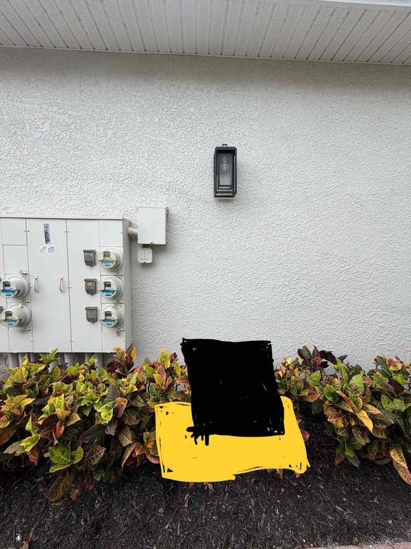 Naples, FL - Conducted on-site assessment for mini split system installation at residential property. Evaluated exterior wall mounting location near utility meter panel and interior garage space for indoor unit placement. Documented existing electrical infrastructure, wall construction, and clearance requirements for both outdoor condenser and indoor air handler units. Photographed proposed installation areas to develop equipment specifications and labor estimate.