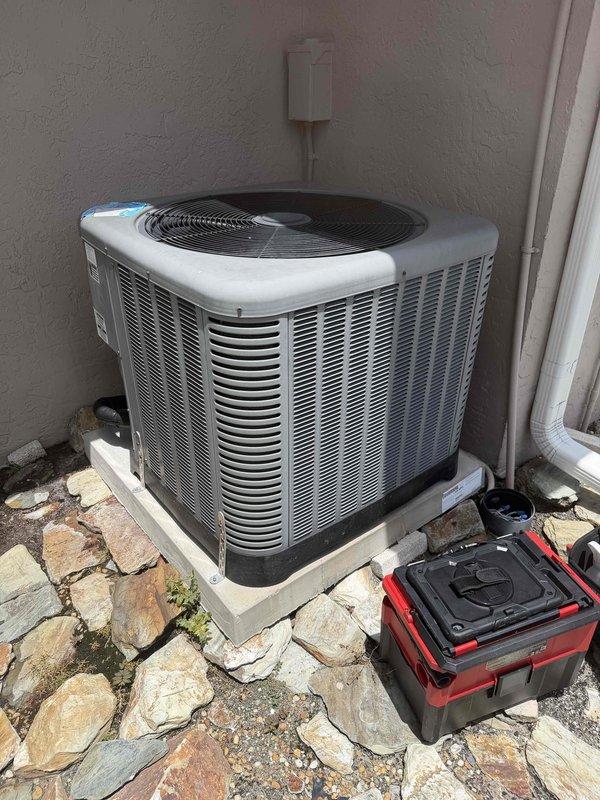 Completed fourth and final maintenance visit under the 2 Year Catalyst Membership agreement. Performed comprehensive preventive maintenance on residential HVAC system, including inspection of attic-mounted air handler unit (14 SEER, 60 Amp) and outdoor condenser unit. Both components were found to be operating within normal parameters, with all safety labels and manufacturer specifications verified. Documented equipment condition through photography for service records and offered membership renewal upon completion of this final scheduled visit.