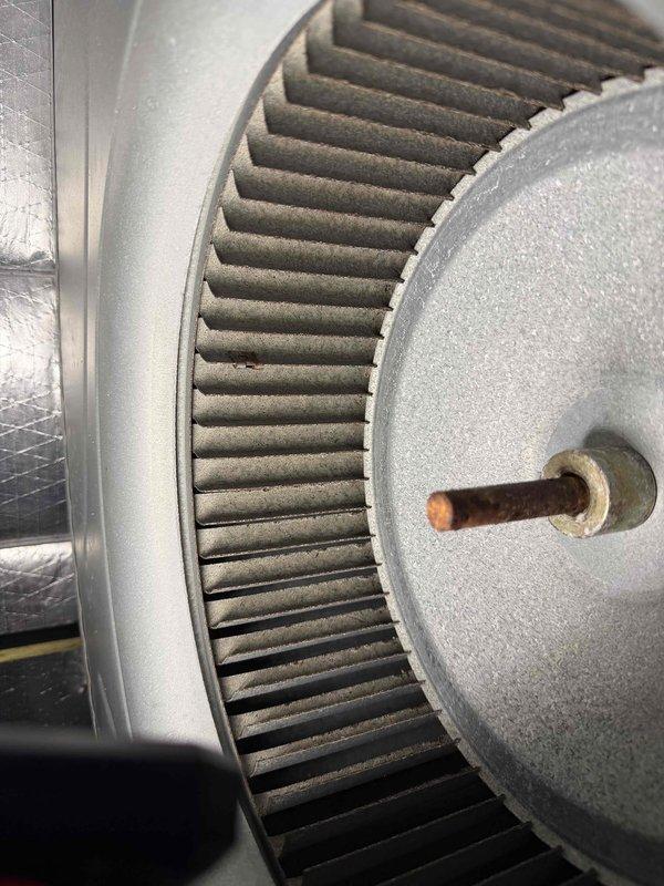 Fort Myers, FL - Responded to service call for AC unit experiencing intermittent operation and no cooling. Upon inspection, found significant debris and dirt accumulation on evaporator coil fins, with heavy buildup of lint and fibrous material concentrated in lower sections restricting airflow. Blower wheel assembly showed substantial dust and debris accumulation on blades affecting system performance. Documented current condition of both components with photographs for maintenance records. Unit requires thorough cleaning of evaporator coil and blower wheel to restore proper airflow and cooling capacity.