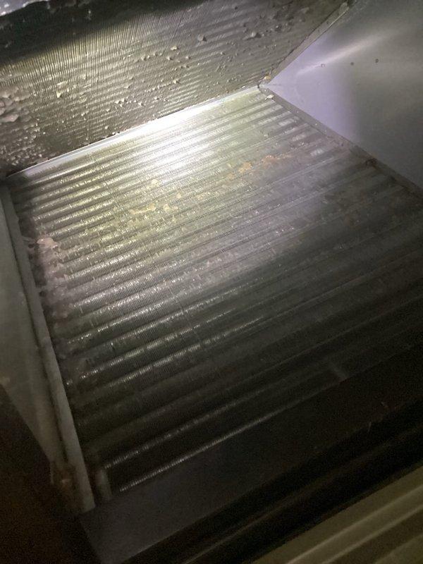 Fort Myers, FL - Responded to service call for air conditioning system not cooling properly since installation. Previous contractor had made multiple service attempts without resolution. Upon inspection, discovered heavily soiled evaporator coil with significant dust and debris accumulation restricting airflow. Coil fins showed substantial dirt buildup affecting heat transfer efficiency. Documented conditions with photos showing extent of contamination on coil surfaces and fins. Took temperature and measurement readings at unit. System appears to have been operating in compromised state, preventing adequate cooling performance. Provided detailed assessment and quote for necessary coil cleaning and system evaluation to restore proper operation.