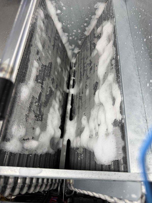 Naples, FL - Completed first quarterly preventive maintenance inspection on two HVAC systems as part of annual maintenance agreement. Inspected 3-ton air handling unit with 5KW heat strip, verifying proper operation and documenting equipment condition with installed ductwork and refrigerant line connections. Discovered significant frost and ice accumulation on evaporator coil assembly, indicating potential airflow restriction, refrigerant charge issue, or defrost cycle malfunction requiring further diagnosis. Documented conditions with photographs for service records. Mini split system inspection deferred to October schedule as previously planned.