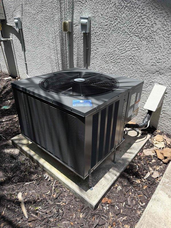 Naples, FL - Completed second routine maintenance visit of four scheduled appointments under 2 Year Catalyst Membership for two HVAC systems. Performed comprehensive inspection and maintenance on outdoor condensing unit and indoor DURASTAR vertical air handler. Documented equipment conditions through photographs showing proper installation, safety labels, and operational components. Mini split system maintenance deferred to scheduled October service date per maintenance agreement timeline.