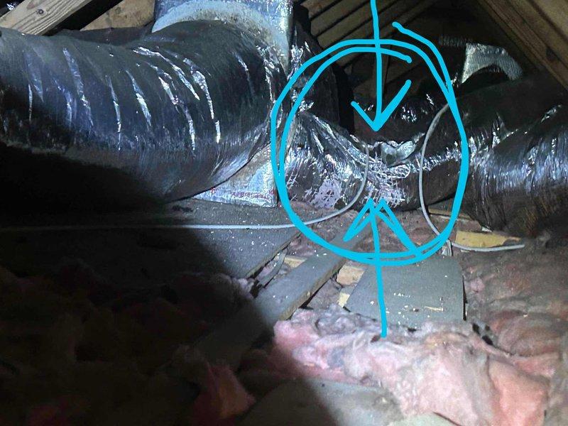 Fort Myers, FL - # HVAC Maintenance Inspection

Completed comprehensive clean and check maintenance service on residential HVAC system. Performed thorough inspection of attic-installed equipment including flexible ductwork, metal plenum, and associated connections. Examined condition of reflective insulation wrapping on main supply ducts and plenum box, noting normal wear patterns and aged tape residue at connection points. Verified integrity of duct connections and metallic foil tape sealing at junction points. Assessed fiberglass insulation placement around ductwork system. Documented current system condition through photographic records showing ductwork configuration, plenum installation, and attic space layout. All components found operational with standard aging characteristics typical of residential HVAC installations. System ready for continued service.