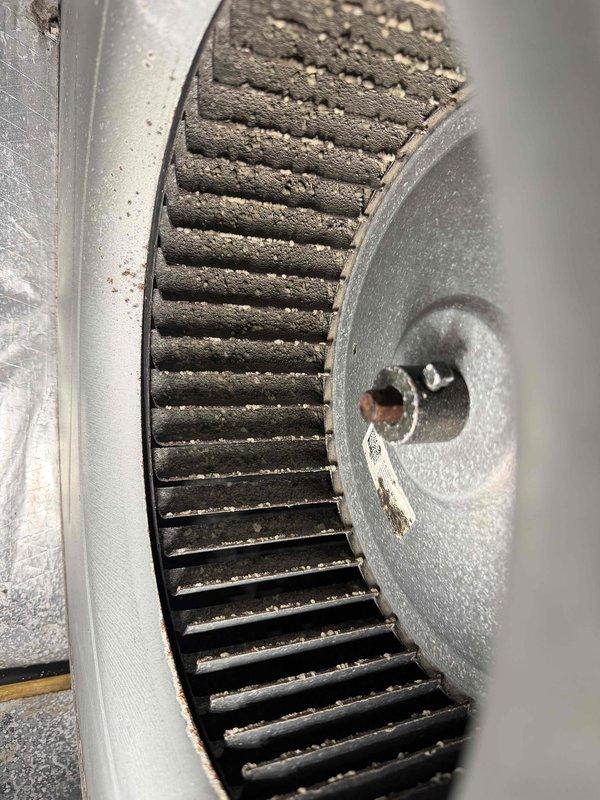 Fort Myers, FL - Completed third quarterly preventive maintenance inspection on Lennox HVAC system. Accessed and inspected blower assembly, documenting heavy dust and debris accumulation on squirrel cage fan wheel blades and interior surfaces. Photographed unit condition and verified manufacturer specifications and labeling on equipment cabinet.