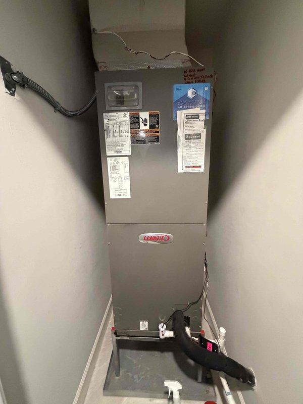 Fort Myers, FL - Completed third quarterly preventive maintenance inspection on Lennox HVAC system. Accessed and inspected blower assembly, documenting heavy dust and debris accumulation on squirrel cage fan wheel blades and interior surfaces. Photographed unit condition and verified manufacturer specifications and labeling on equipment cabinet.