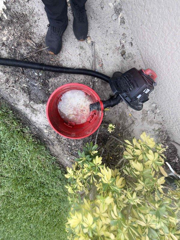 Completed preventative maintenance inspection as part of routine 4 of 4 service visit for active membership holder. Performed comprehensive system evaluation including equipment diagnostics using handheld testing instrument to measure electrical parameters and system performance in utility area. Inspected interior mechanical components and assessed wall-mounted equipment for proper operation, noting moisture indicators and environmental conditions in service space. Conducted exterior equipment assessment with ice bath testing procedures to verify proper refrigerant levels and system efficiency. All maintenance procedures completed per manufacturer specifications with photographic documentation of work performed for service records.
