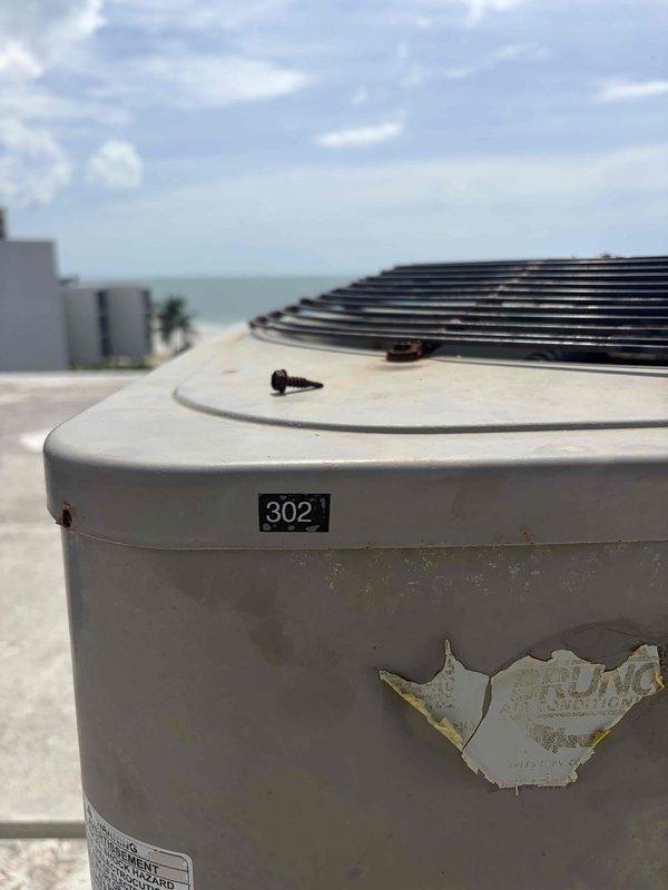 Conducted comprehensive estimate for complete HVAC system replacement at multi-unit property. Evaluated existing indoor air handler unit located in mechanical closet and assessed rooftop condenser unit #302 showing significant wear and paint deterioration. Documented current equipment specifications, configuration, and condition to provide accurate replacement system recommendations.