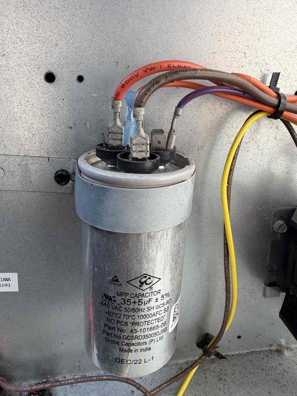 Completed fourth and final routine maintenance visit of the 2 Year Catalyst Membership program. Performed comprehensive system inspection including electrical components and airflow systems. Documented dual-run capacitor (35+5µF, 440 VAC) showing proper wire connections and terminal assembly condition. Inspected blower wheel assembly, noting moderate dust and particulate accumulation on blades and housing surfaces that may impact airflow efficiency. All electrical connections secure with appropriate wire terminations observed. System operational at time of service. Recommended membership renewal to continue preventive maintenance coverage.