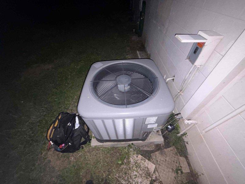 Responded to no-cooling call where outdoor condensing unit was humming but fan not operating. Upon arrival, verified compressor running but condenser fan motor inoperative. Diagnosed failed fan motor and/or defective run capacitor preventing fan operation. Documented equipment conditions including thermostat reading 74°F with cooling demand and outdoor unit configuration. Unit requires fan motor replacement or capacitor replacement to restore proper operation and cooling capacity.