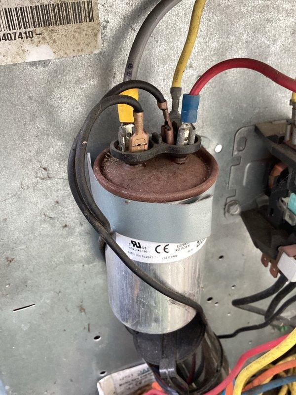 Cape Coral, FL - Completed fourth quarterly preventive maintenance inspection on 12-year-old HVAC system serving 1240 square foot space. Performed comprehensive system evaluation including inspection of capacitor, electrical connections, and wiring integrity. Documented equipment condition with photographs showing capacitor with multiple wire connections (yellow, gray, black, and red/yellow wires) mounted on system components, all connections appearing secure with proper heat shrink protection in place. System operational and maintenance cycle complete.