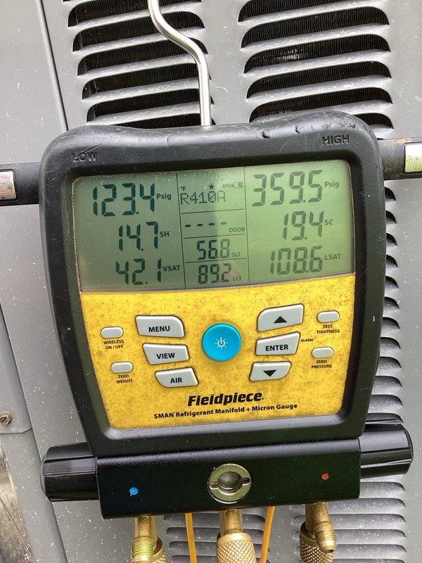 Cape Coral, FL - Responded to service call regarding 10-degree temperature split identified during preventive maintenance. Connected Fieldpiece SMAN manifold gauge to R410A system and performed comprehensive diagnostic testing of refrigerant pressures, superheat, and subcooling values. Measurements indicated pressures of 123.4 psig on low side and 359.5 psig on high side, with superheat reading of 14.7°F and subcooling of 19.4°F. Inspected dryer ventilation system and ductwork for potential airflow restrictions that could impact HVAC performance. Documented all findings with photographs for review prior to discussing results with homeowner per special instructions. System operational at time of departure pending further consultation.