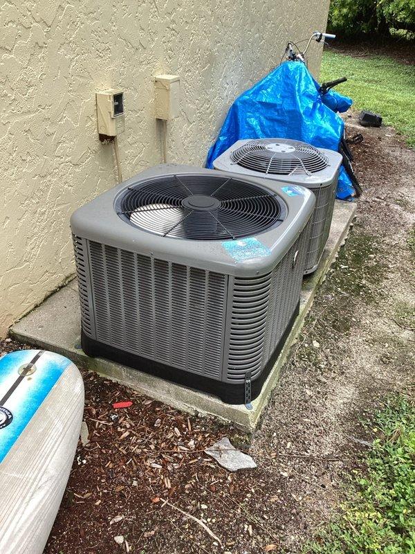 Naples, FL - Responded to no cooling call on residential HVAC system. Upon arrival, inspected outdoor condenser units and confirmed system operational status. Unit had stopped cooling the previous night. Documented equipment condition with photos showing dual condenser units positioned on concrete pads with proper clearances maintained. Verified electrical connections and reviewed system wiring diagram on interior panel. System has scheduled maintenance appointment in November for routine service.