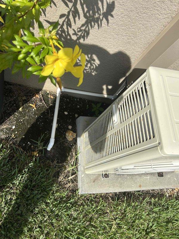 Cape Coral, FL - Completed on-site evaluation for mini split system installation at residential property. Assessed existing outdoor condenser unit location and surrounding area conditions, including clearance requirements and proximity to landscaping. Documented current electrical panel configuration and available breaker capacity to determine compatibility with proposed mini split system. Photographed installation site showing adequate space on exterior wall with stucco finish and confirmed suitable mounting surface for indoor air handler unit. Evaluated electrical infrastructure including main panel with available circuits rated at 15-20 amps to support new mini split installation requirements.