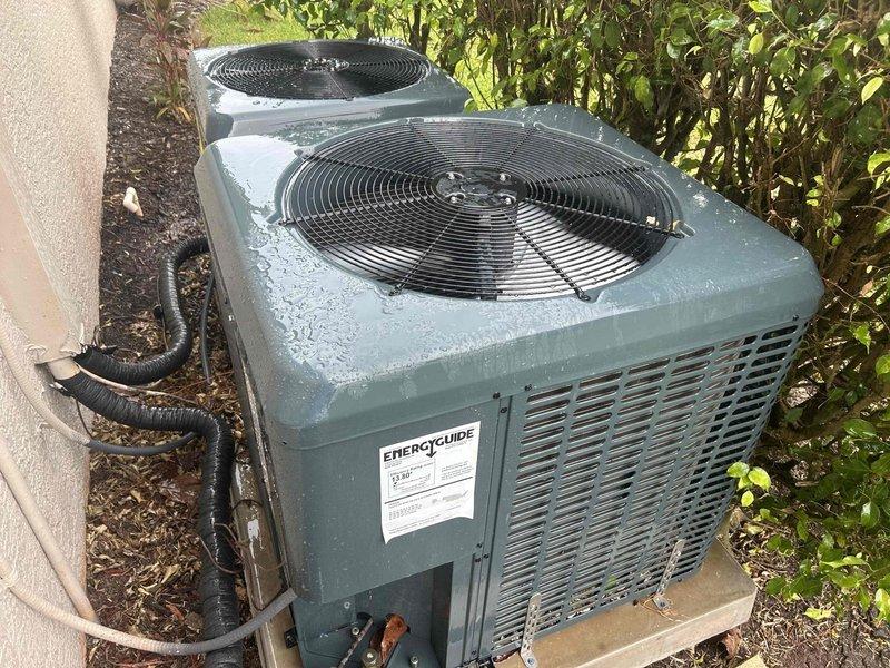 Naples, FL - Conducted comprehensive site assessment for duct cleaning estimate at property with two exterior HVAC condenser units and accessible interior ductwork system. Customer was referred by supplier after experiencing issues with previous contractors, requiring detailed evaluation of existing equipment and ductwork conditions to provide accurate repair and cleaning specifications.

Inspected dual EnerGuide condenser units positioned on concrete pad with visible weathering and surface accumulation, noting electrical conduit connections and overall operational configuration. Assessed interior workspace access points and ductwork layout, documenting white-painted duct sections and structural elements to determine scope of cleaning requirements and identify any necessary repairs or modifications to ventilation system components.