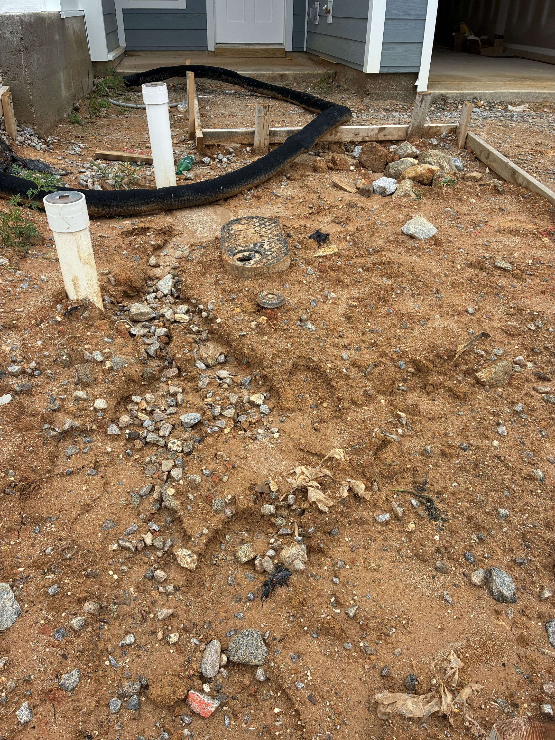 Raised 6 water meter boxes/water meters to correct grade. Relocated 2 boxes and meters out of driveway. 