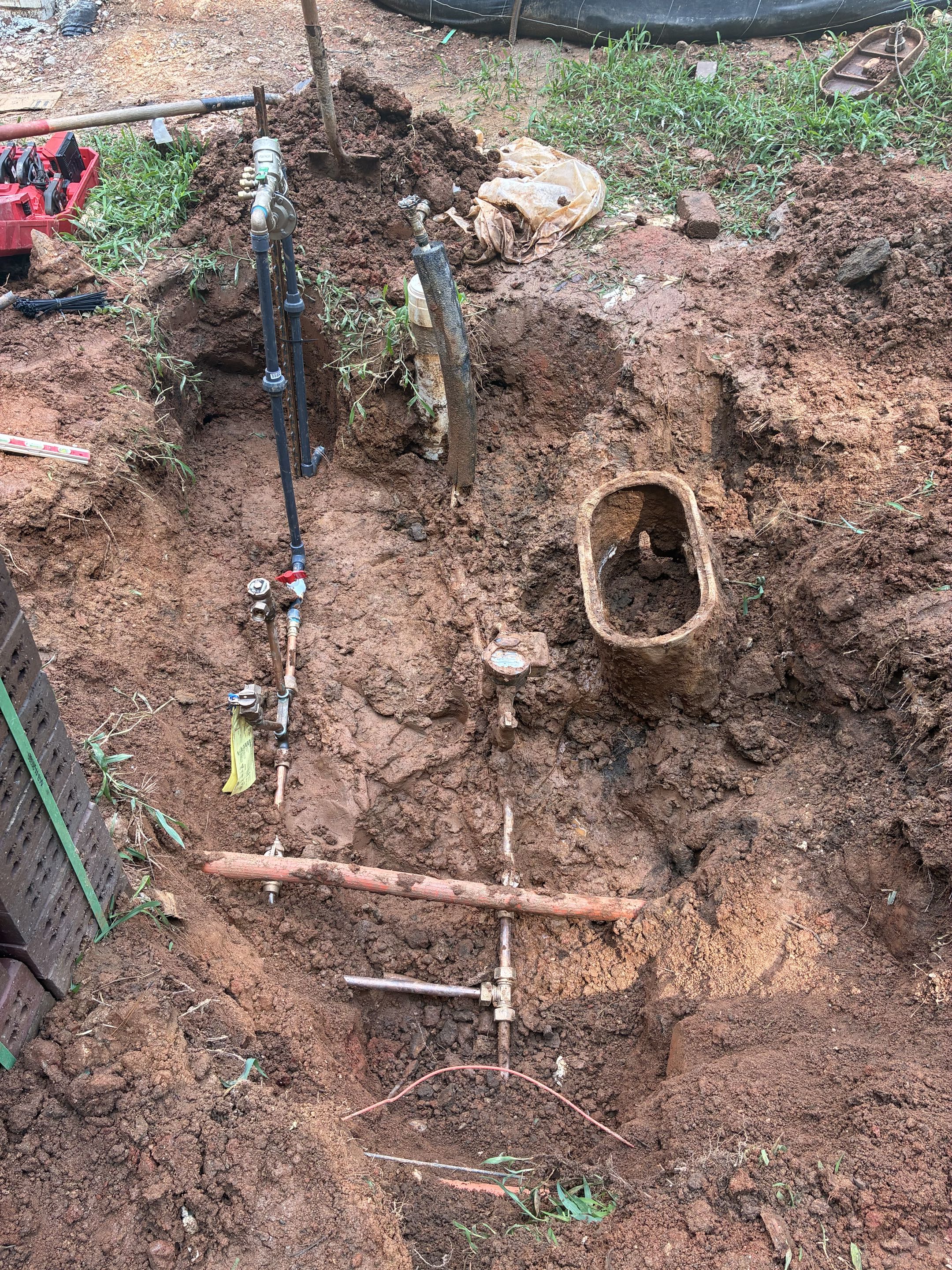 Raleigh, NC - A domestic water line was accessed before the existing water meter. A new water meter was installed to accurately measure residential water usage. An RPZ Reduced Pressure Zone valve was added to safeguard the plumbing system from backflow issues, ensuring safety and regulatory compliance. An irrigation meter was also installed to separately track water used for irrigation, promoting efficient water management. This meter split configuration allows for distinct monitoring of domestic and irrigation water usage. The installation was executed with precision to ensure optimal performance and reliability of the water system. Each component was carefully installed to maintain system integrity and functionality.
