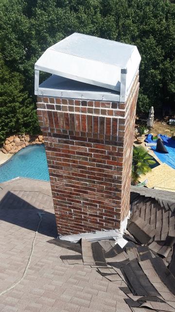 Here to measure for a new custom chimney cap for the home. 